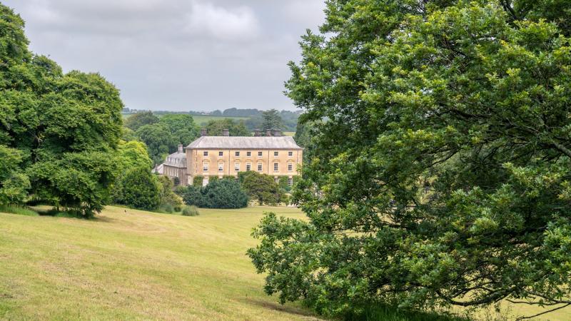 View of Pencarrow House across the park land