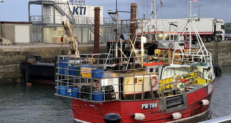 Fishing Boat arriving to unload catch In Padstow